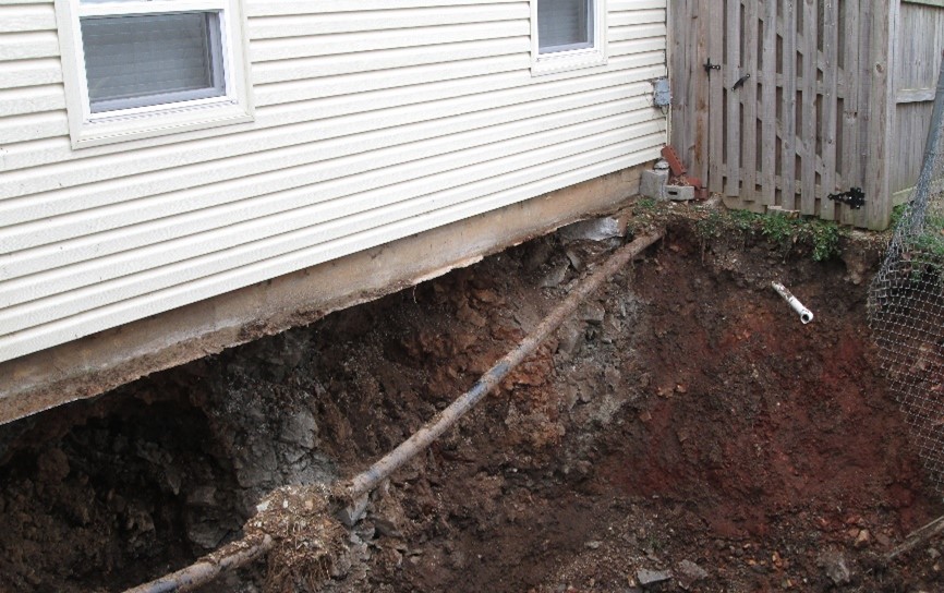 Funds are used for abandoned mine land reclamation projects like this one in Springfield, Missouri, which filled a 190-foot-long vertical mine shaft that caused subsidence between two homes. Photo courtesy of the Missouri Abandoned Mine Lands, Land Reclamation Program.