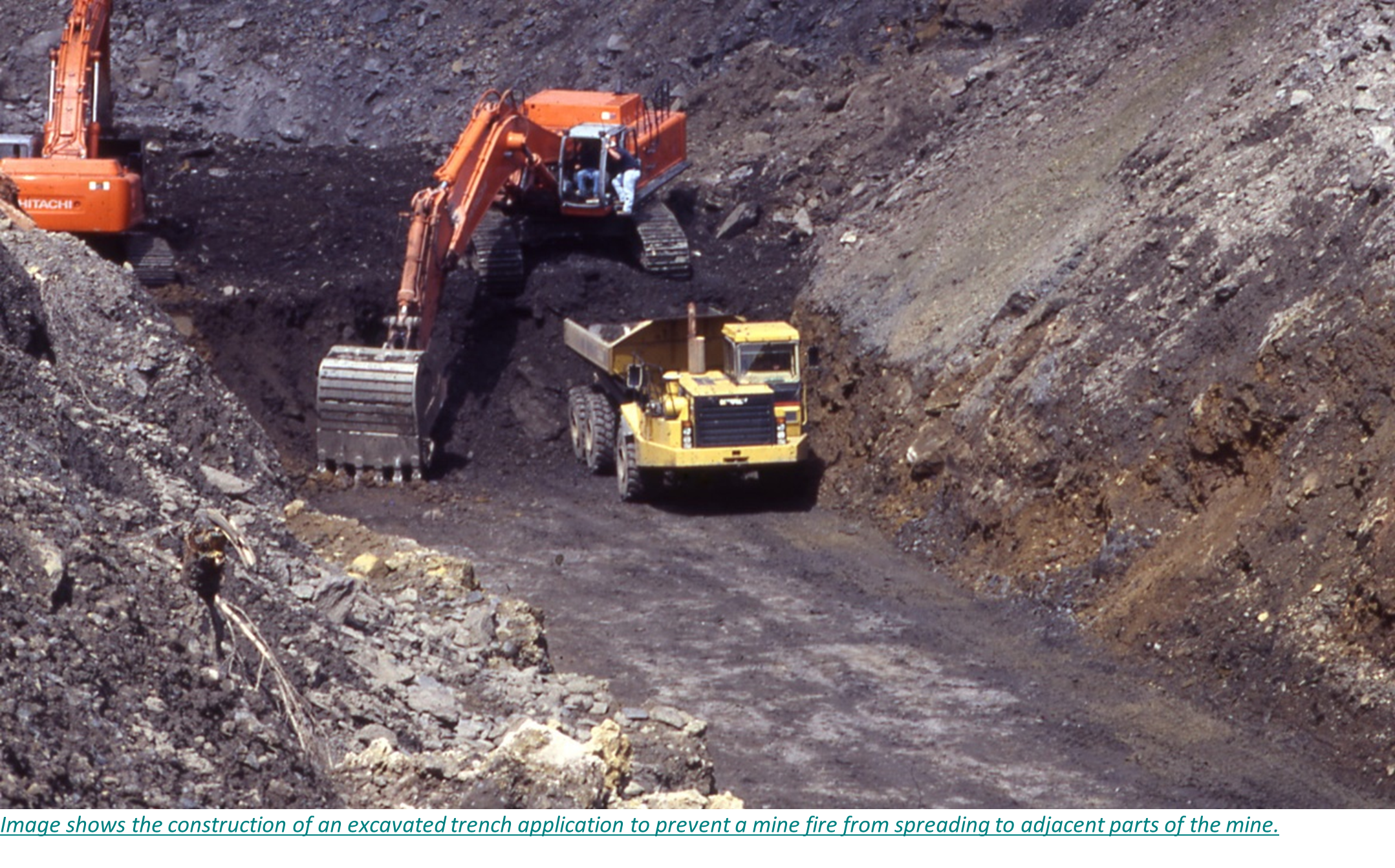 Image shows the construction of an excavated trench application to prevent a mine fire from spreading to adjacent parts of the mine.