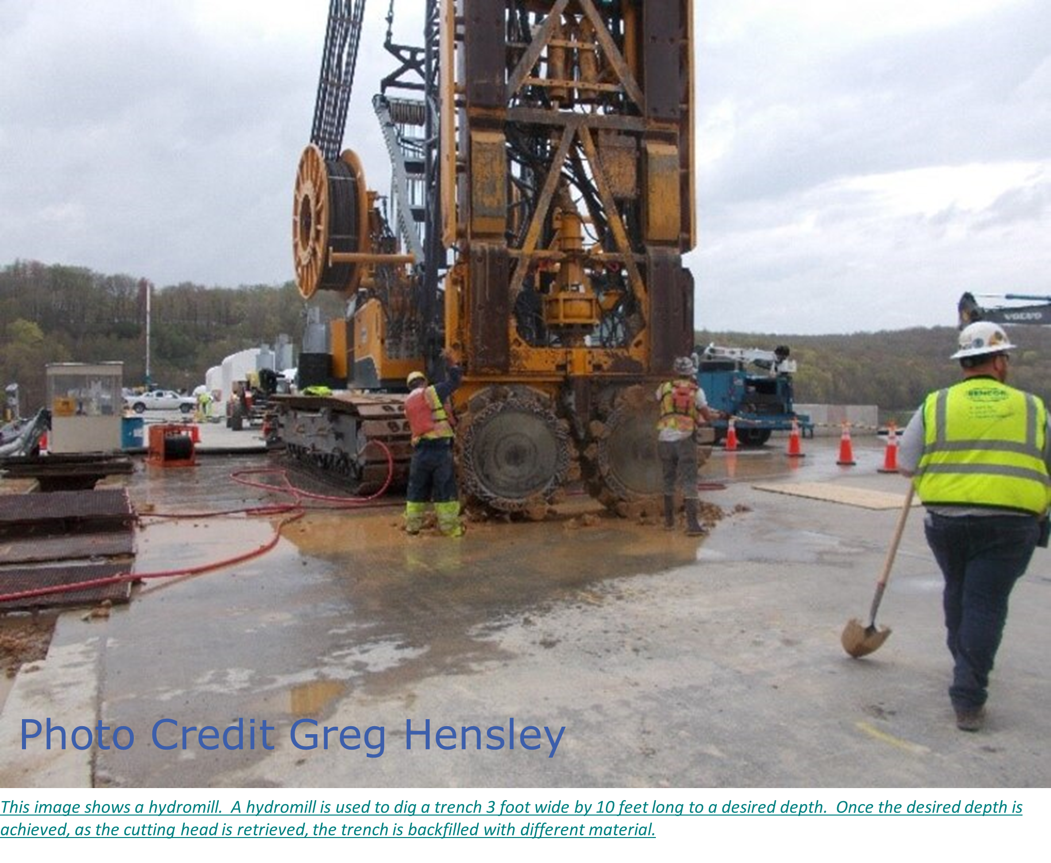 This image shows a hydromill.  A hydromill is used to dig a trench 3 foot wide by 10 feet long to a desired depth.  Once the desired depth is achieved, as the cutting head is retrieved, the trench is backfilled with different material.