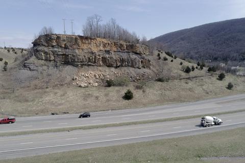 Funds are used for abandoned mine land reclamation projects like this one in Wise County, Virginia, which remediated a dangerous highwall that had been threatening public safety on the adjacent roadways. Photo courtesy of the Virginia Abandoned Mine Land Program.