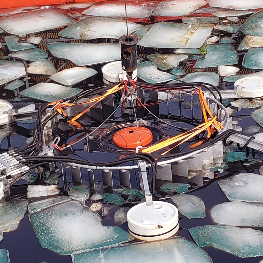 Icy tank water with equipment submerged